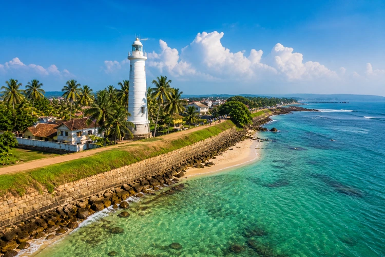 Galle Dutch Fort lighthouse and coastal view with turquoise ocean in southern Sri Lanka