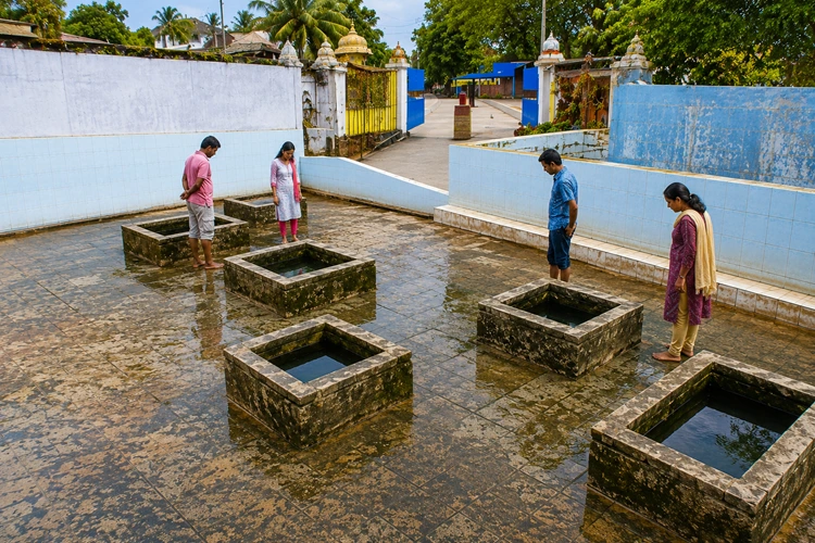 Indian tourists visiting Kanniya Hot Springs in Trincomalee Sri Lanka, a sacred Ramayana site associated with King Ravana